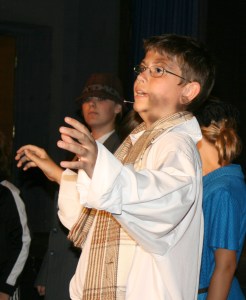 Boy performing as Charlie